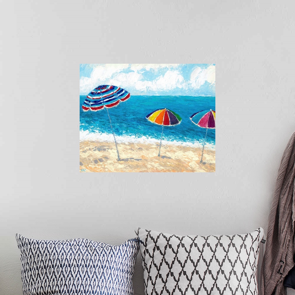 A bohemian room featuring Painting of three beach umbrellas in the sand, overlooking the ocean.