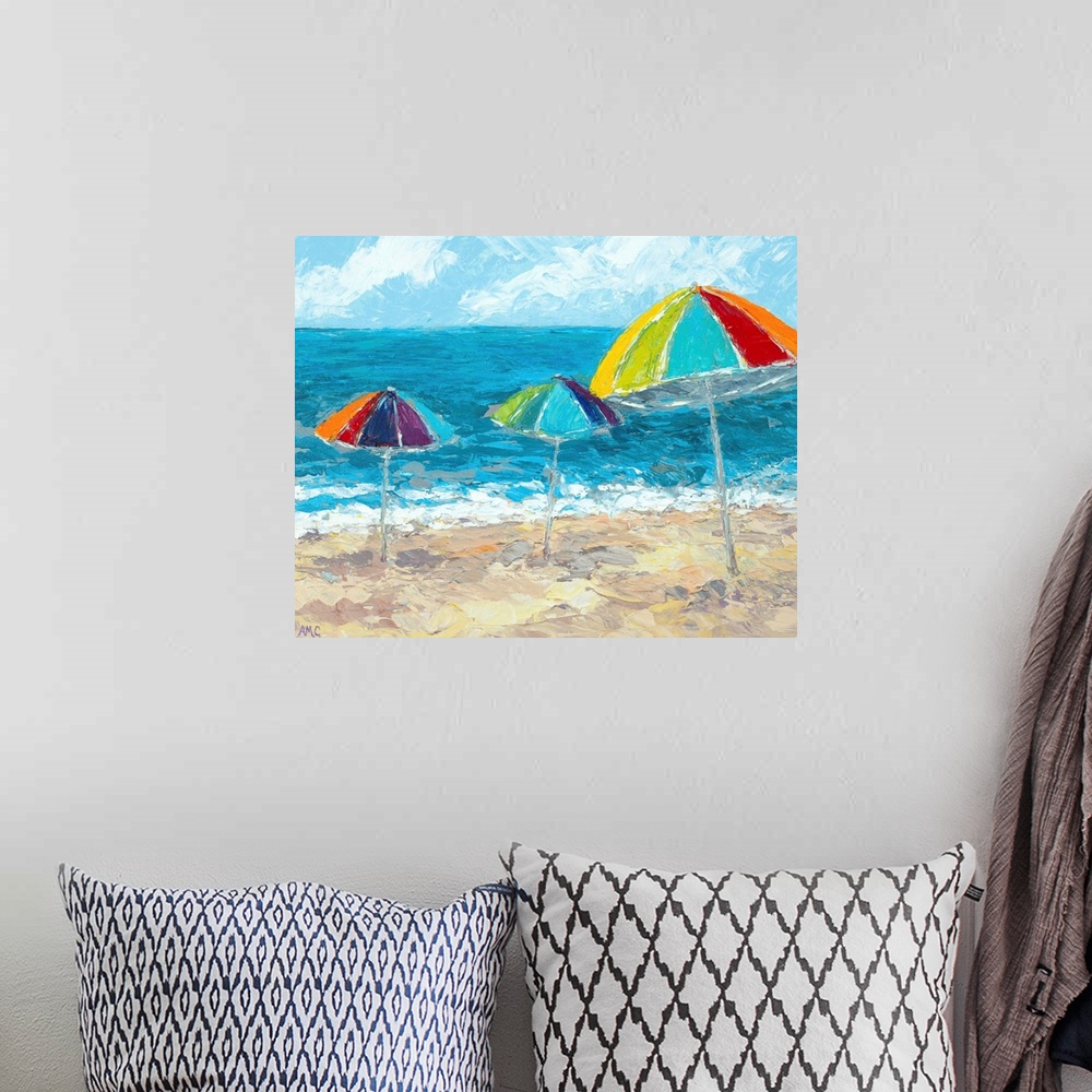 A bohemian room featuring Painting of three beach umbrellas in the sand, overlooking the ocean.