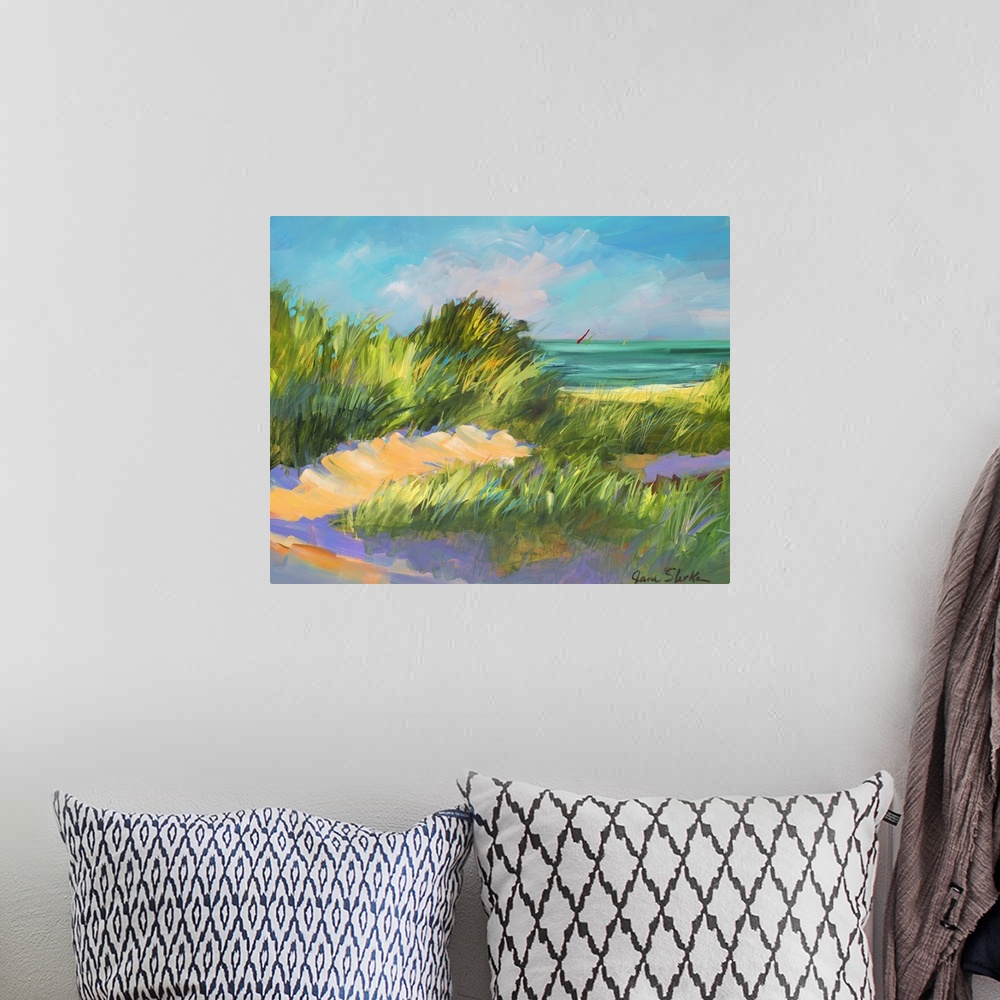 A bohemian room featuring A beautiful piece of artwork that is a painting of grass on the beach dunes that is blowing in th...