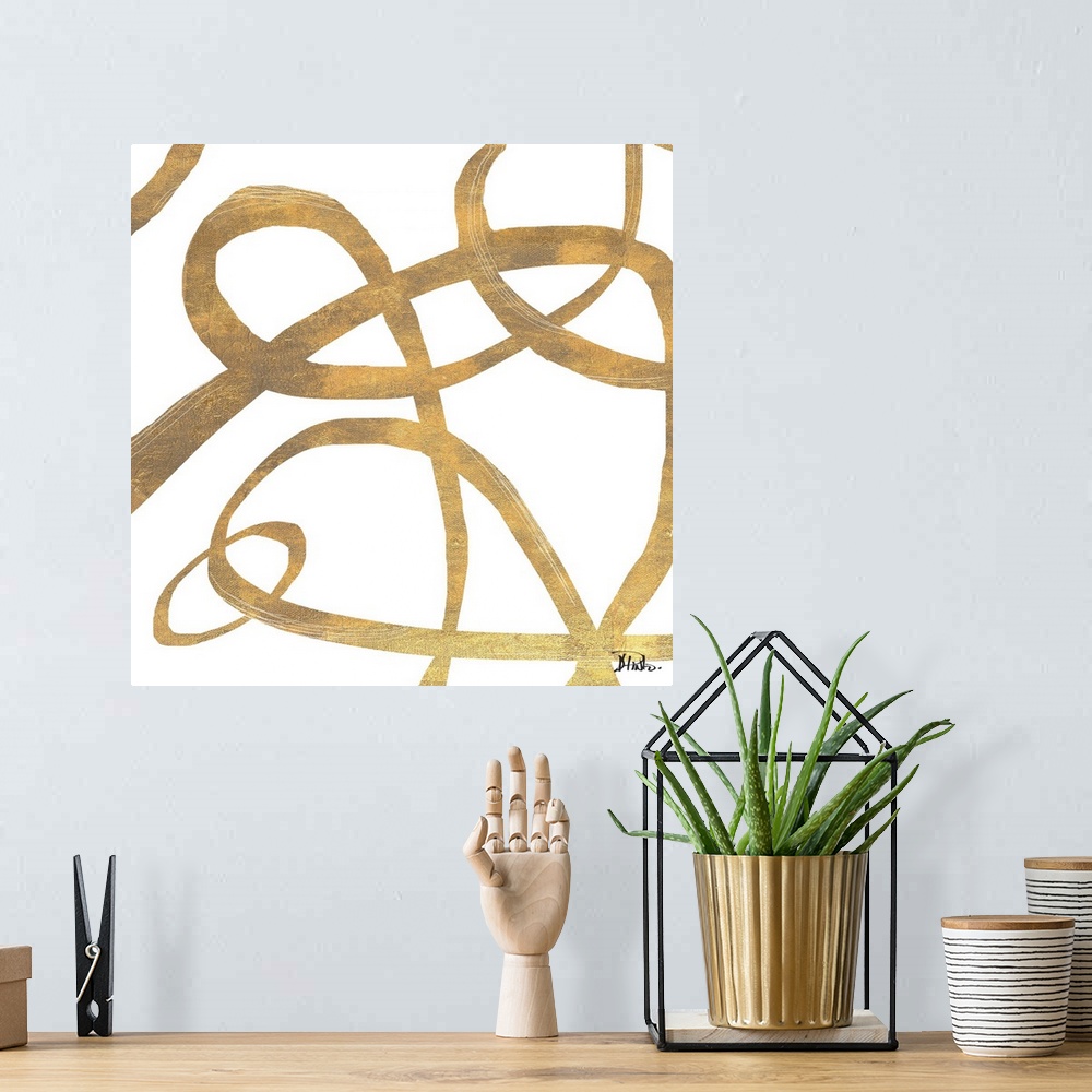 A bohemian room featuring Contemporary abstract artwork of gold swirling lines in circling movements against a white backgr...