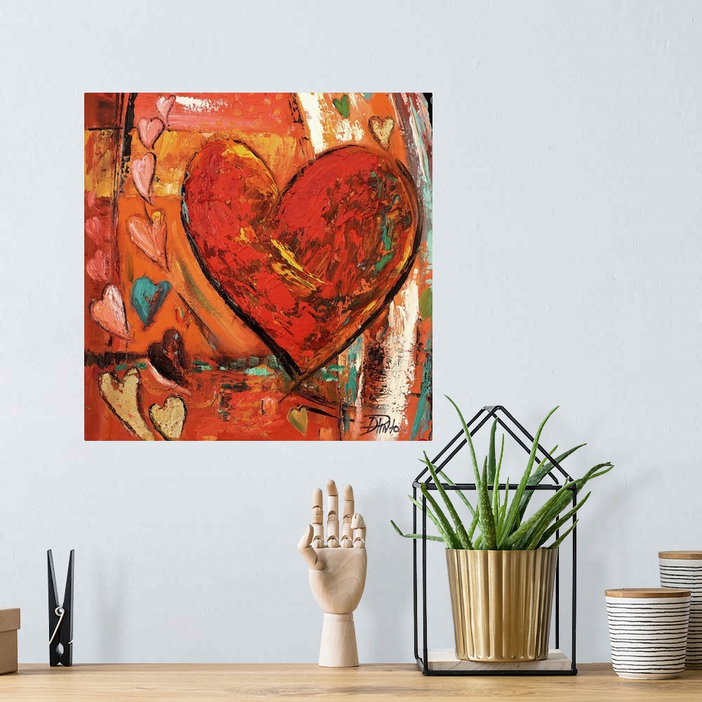 A bohemian room featuring Painting of a large red heart with several smaller hearts around it.