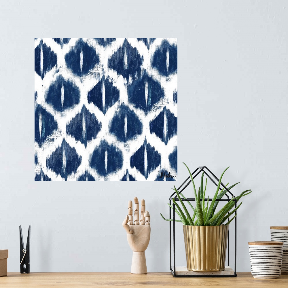A bohemian room featuring Contemporary blue Ikat pattern with a weathered and rustic look to it.