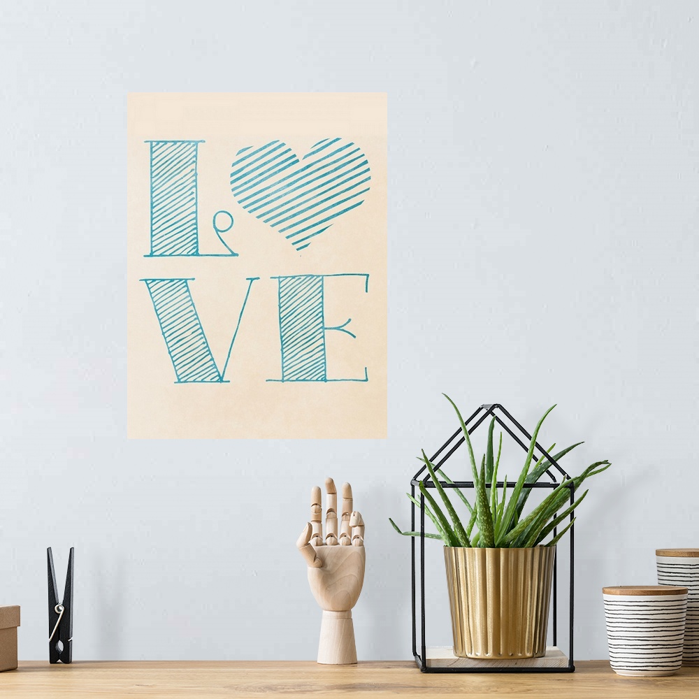 A bohemian room featuring The word "love" in a light blue sketch style, with a heart.