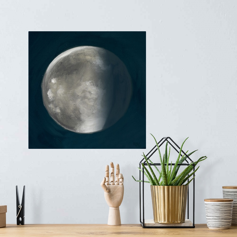 A bohemian room featuring Square painting of the second phase of the moon on a deep blue background.