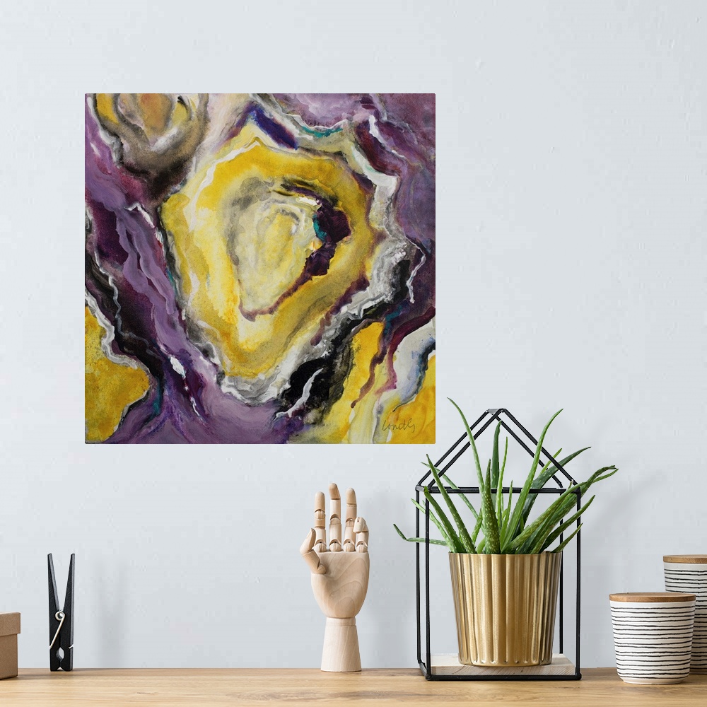 A bohemian room featuring Square abstract painting of quartz showing the purple, gold, white, and black agate.