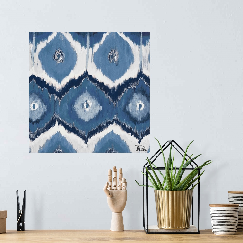A bohemian room featuring Contemporary painting of an Ikat pattern in tones of blue and gray.