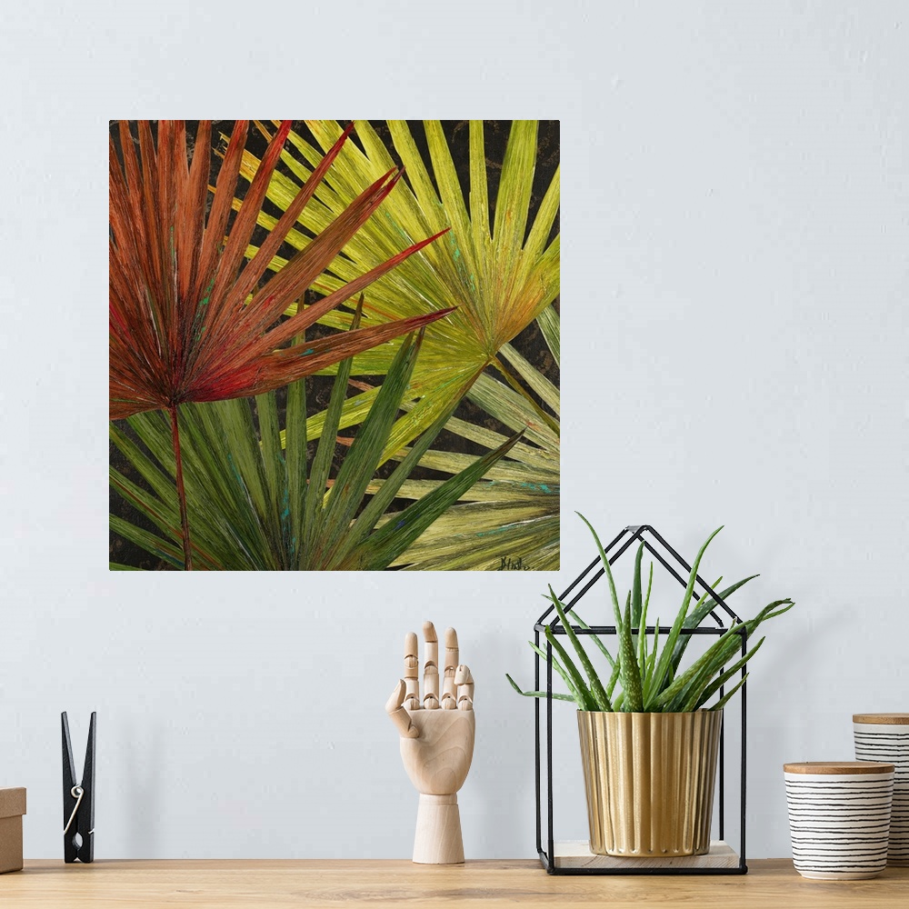 A bohemian room featuring Large artwork of various colored palm tree leaves that overlap each other.