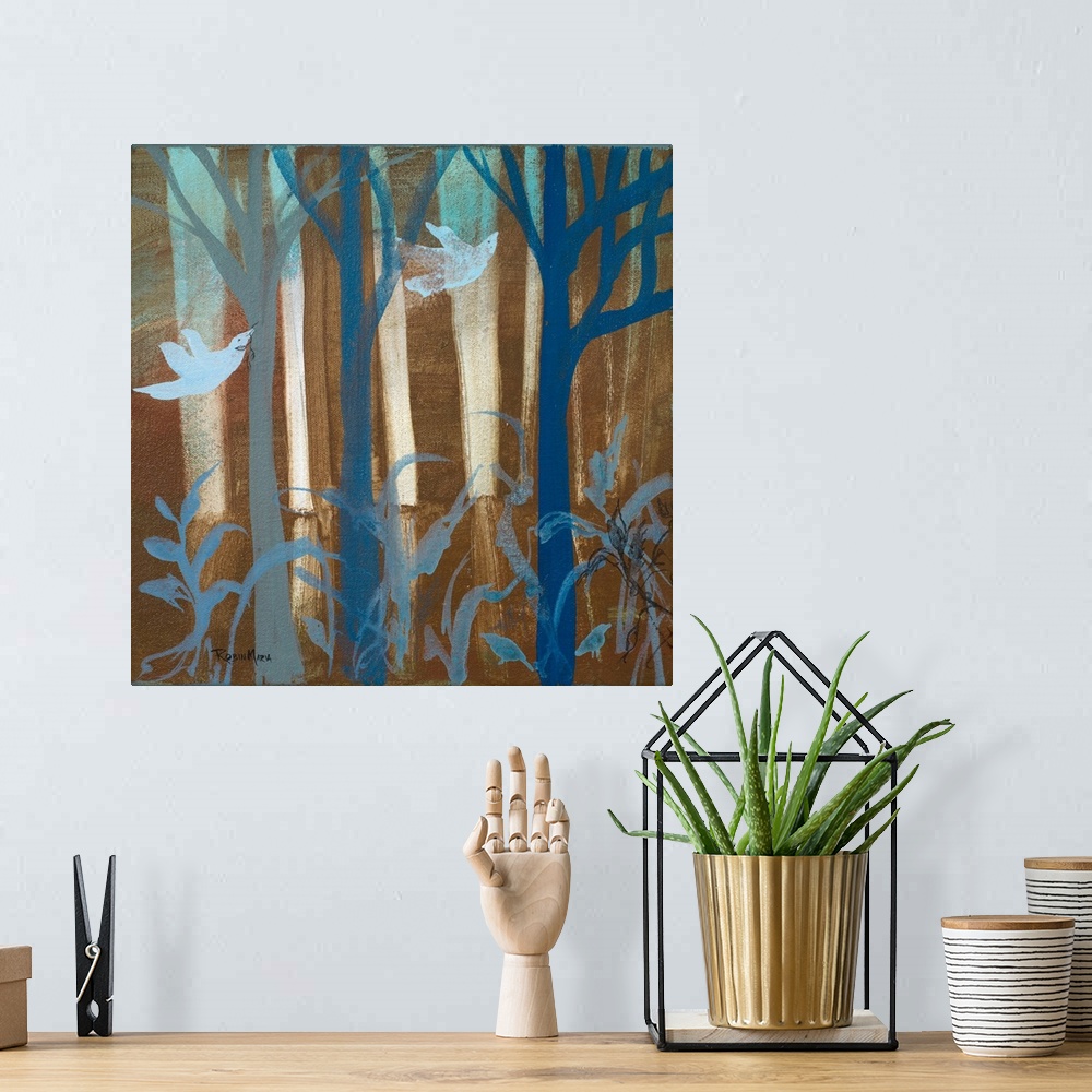 A bohemian room featuring Two pale blue birds flying through a dark brown and blue forest.