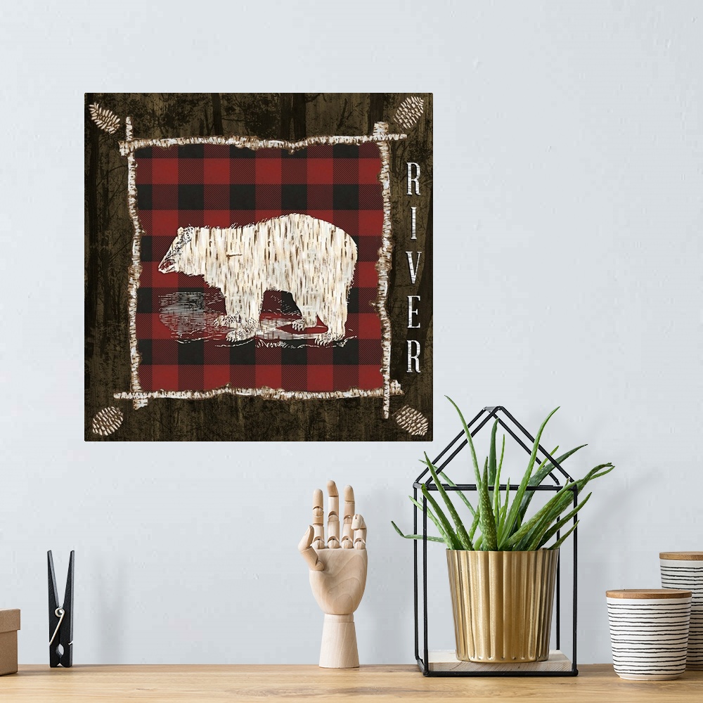 A bohemian room featuring The shape of a bear with a birch pattern on a red flannel.