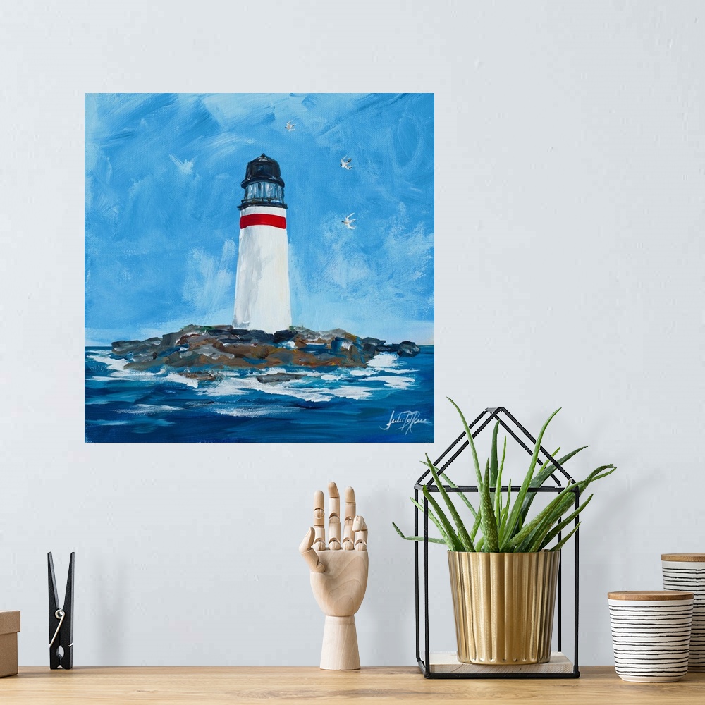 A bohemian room featuring Contemporary square painting of a white lighthouse with one red strip at the top on an island sur...