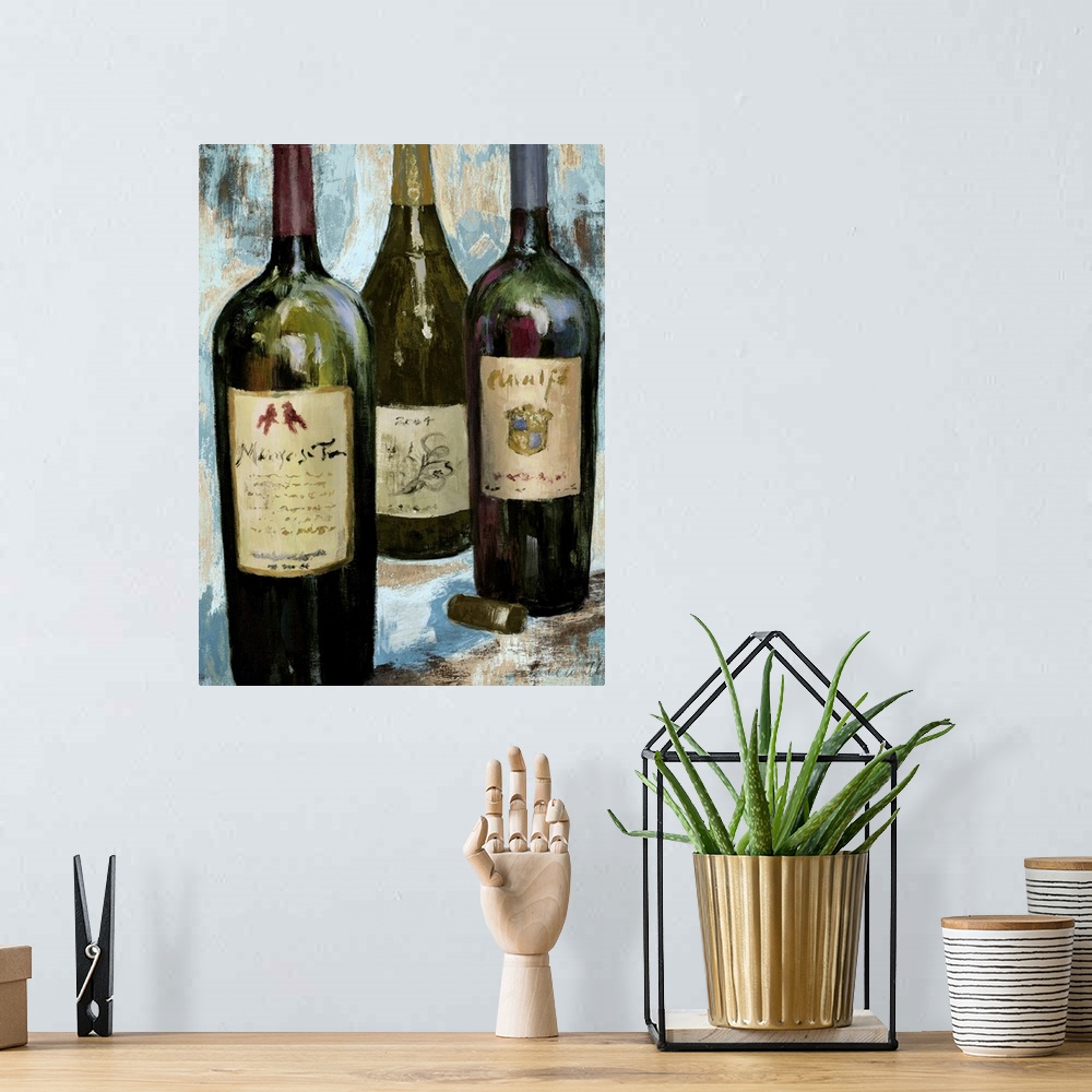 A bohemian room featuring Still life painting of glass red and white wine bottles.