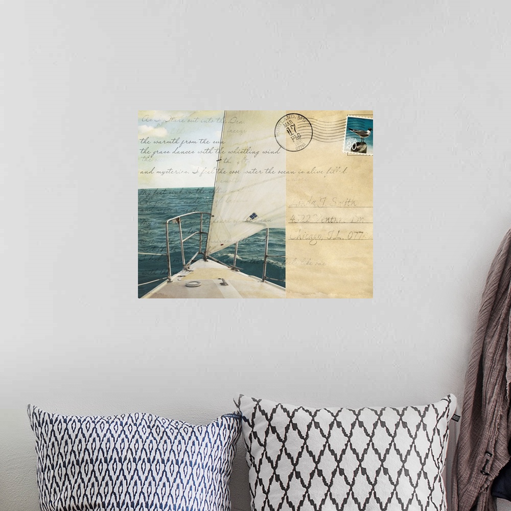 A bohemian room featuring Big print of a postcard with the front tip of a sailboat sailing in the ocean on the left and han...