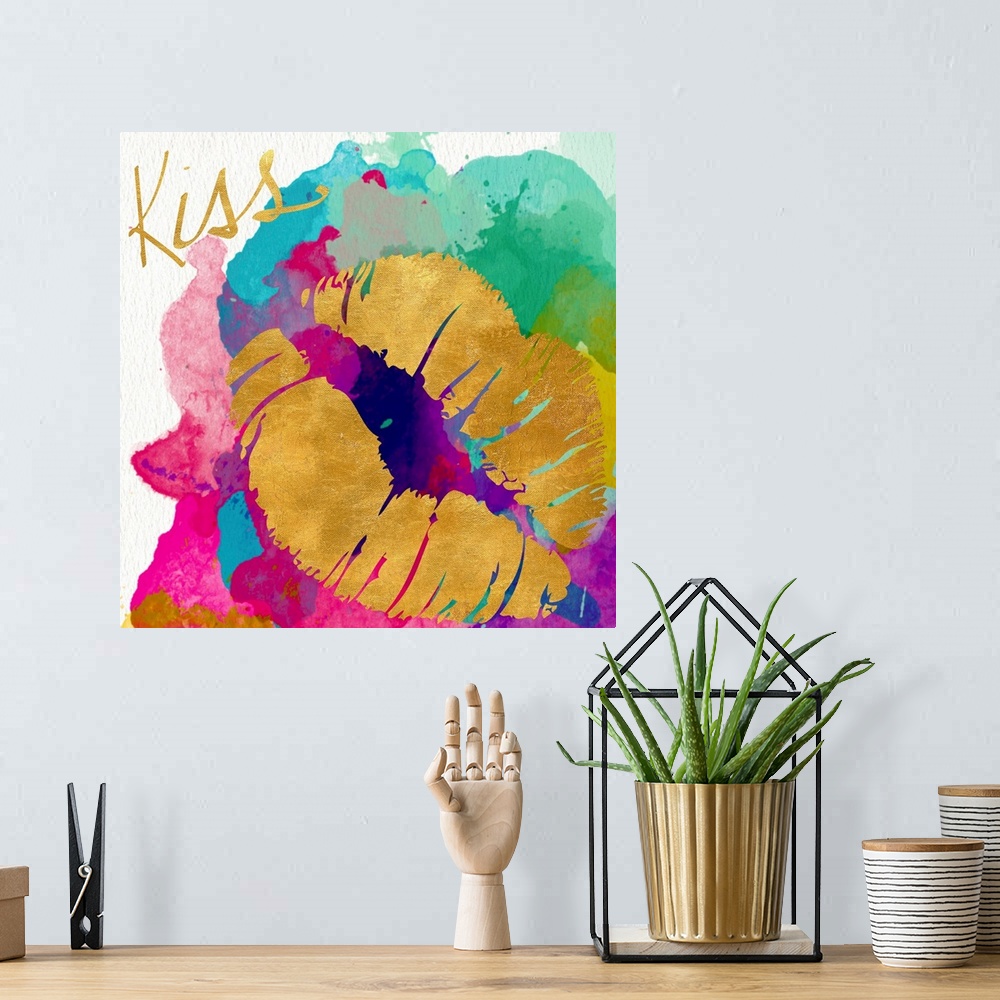 A bohemian room featuring A gold lip print on a multicolored watercolor background.