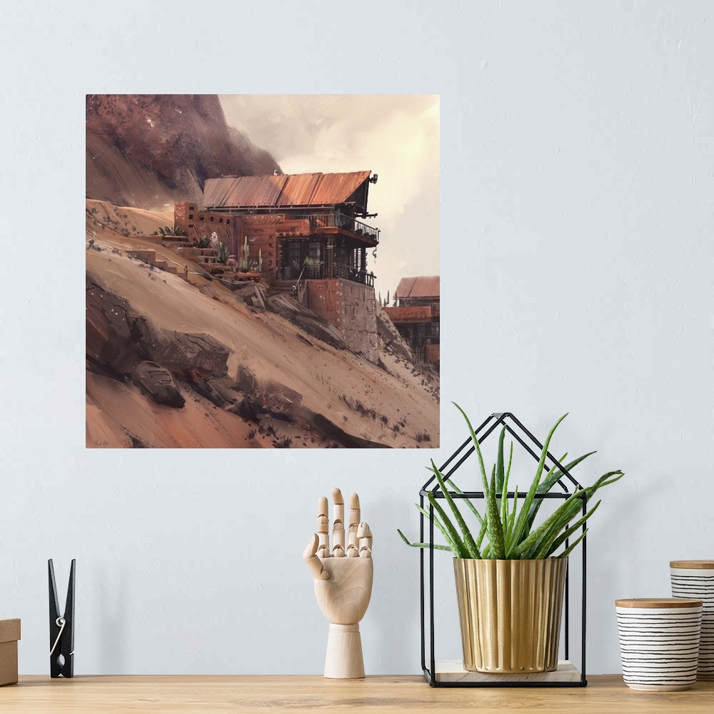 A bohemian room featuring Painting of a house in the desert on steep sandy hill.