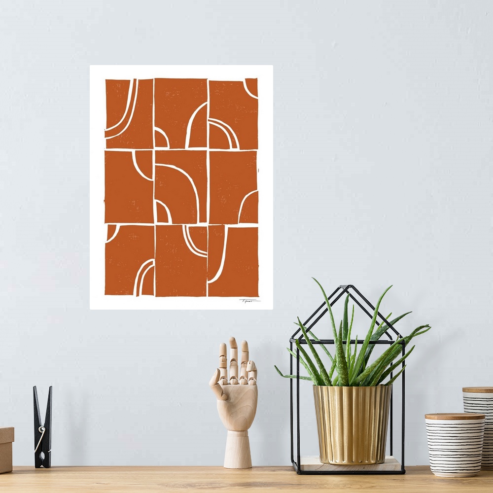 A bohemian room featuring Modern block print shapes with arches in the color burnt orange.