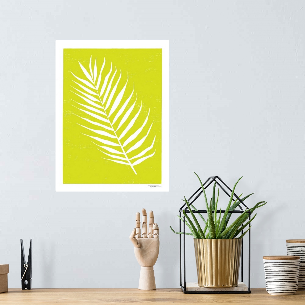 A bohemian room featuring Minimalist block print palm leaf in the color chartreuse.