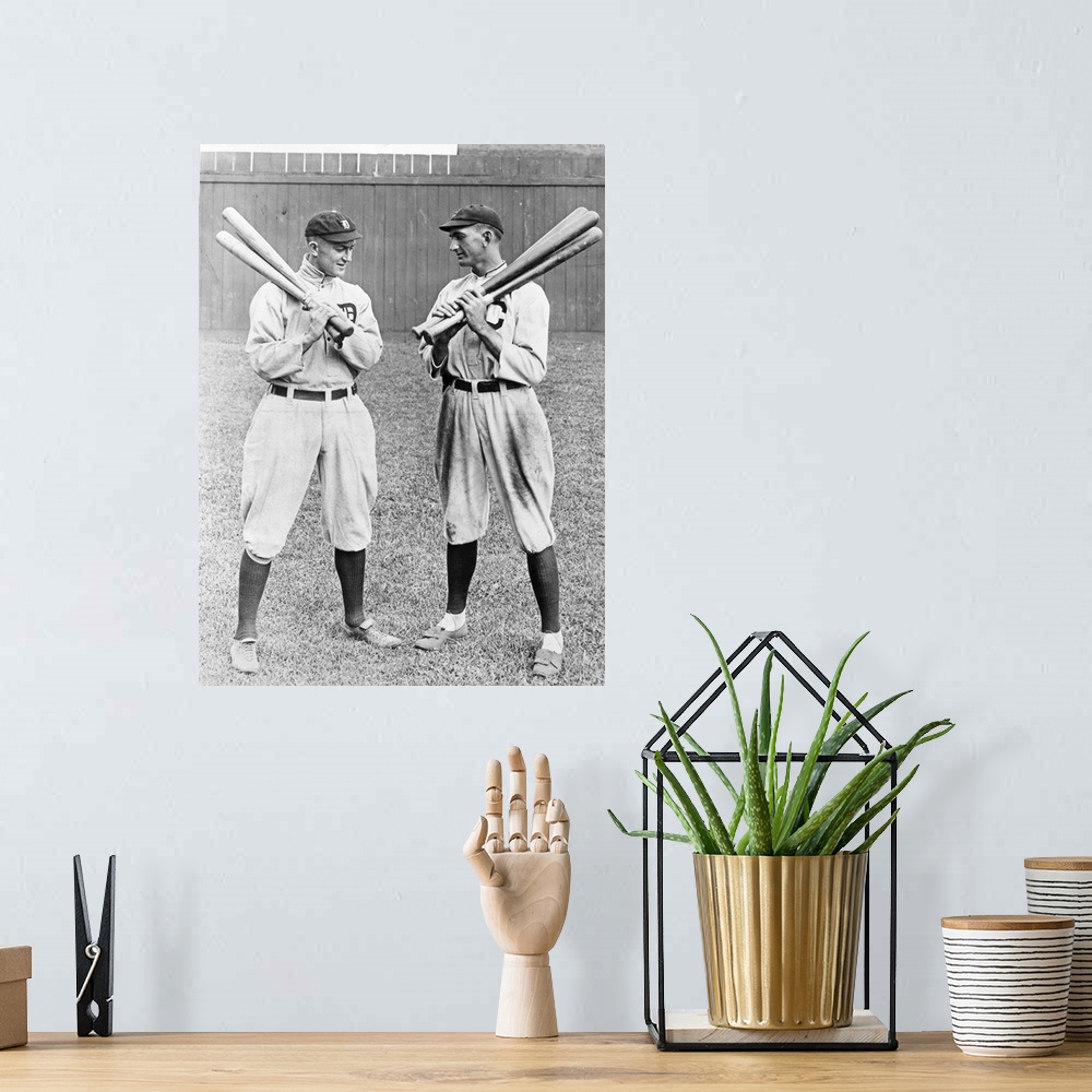 A bohemian room featuring Ty Cobb (1886-1961) and 'Shoeless' Joe Jackson (1888-1951). American baseball players. Photograph...