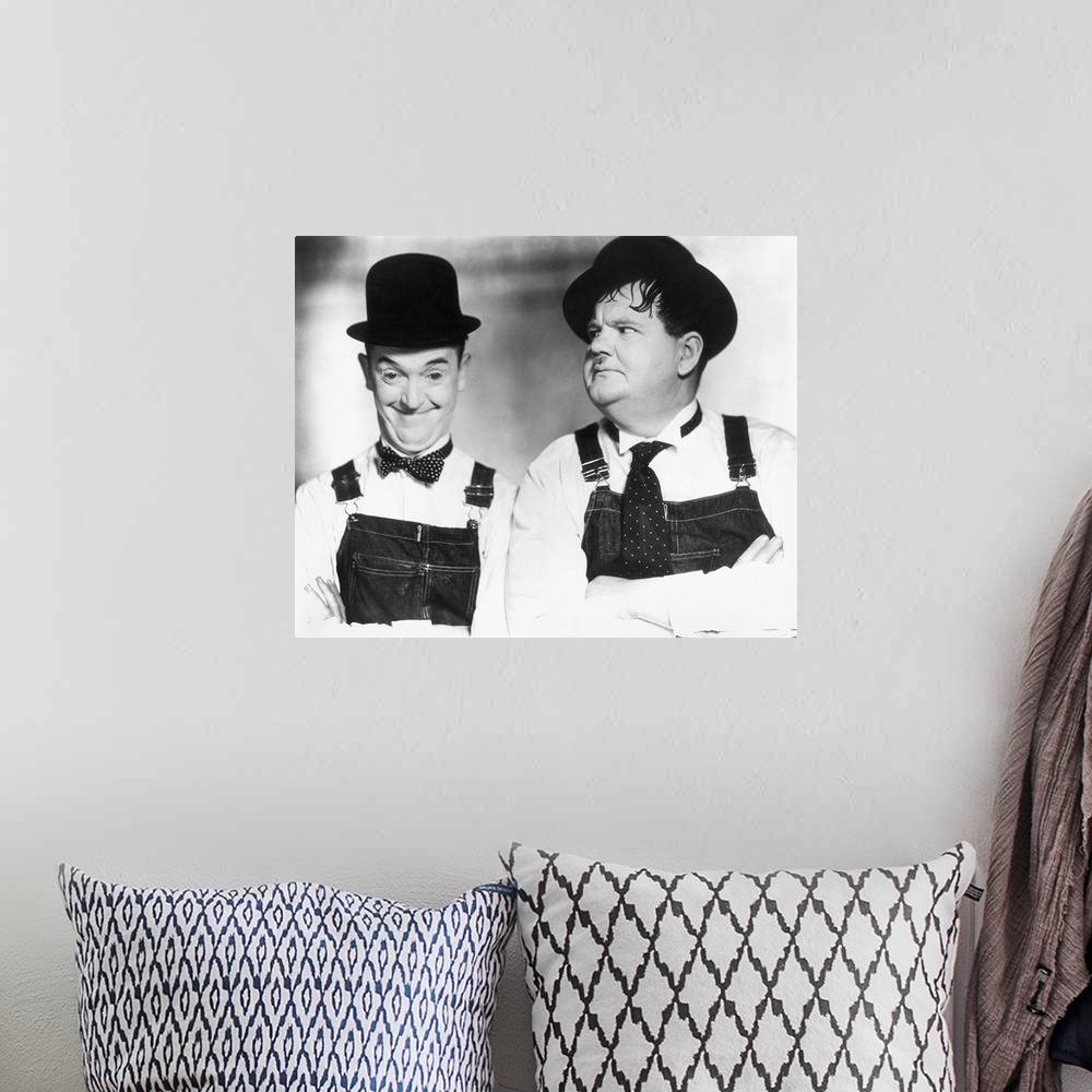 A bohemian room featuring Stan Laurel (left) and Oliver Hardy.