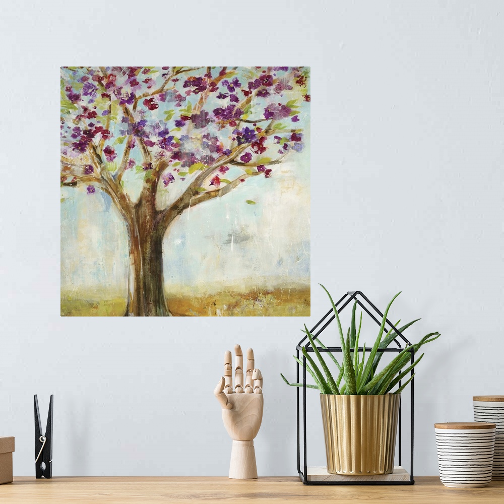 A bohemian room featuring Contemporary painting of a tree with purple blossoming flowers.