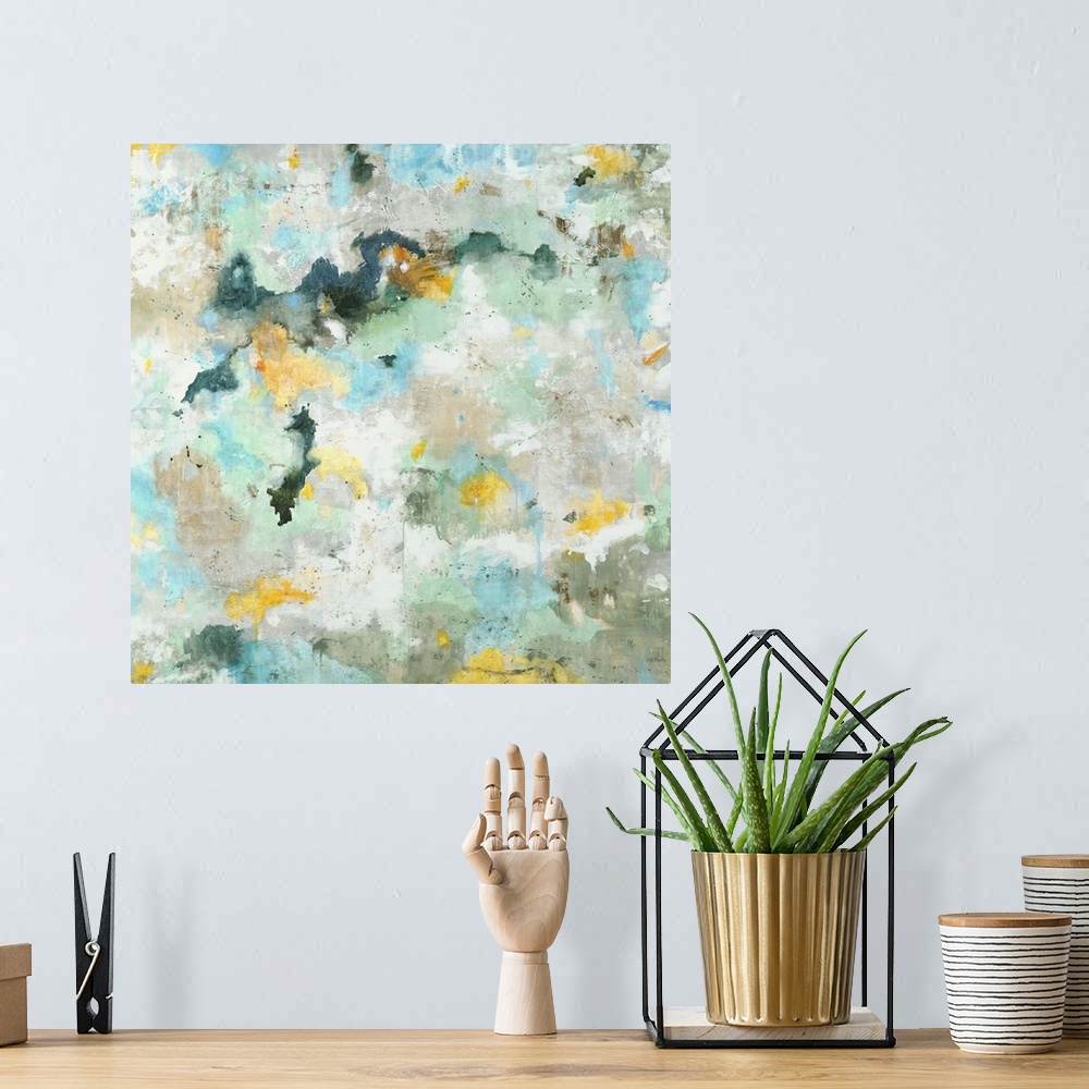 A bohemian room featuring A contemporary abstract painting using aqua and yellow tones.