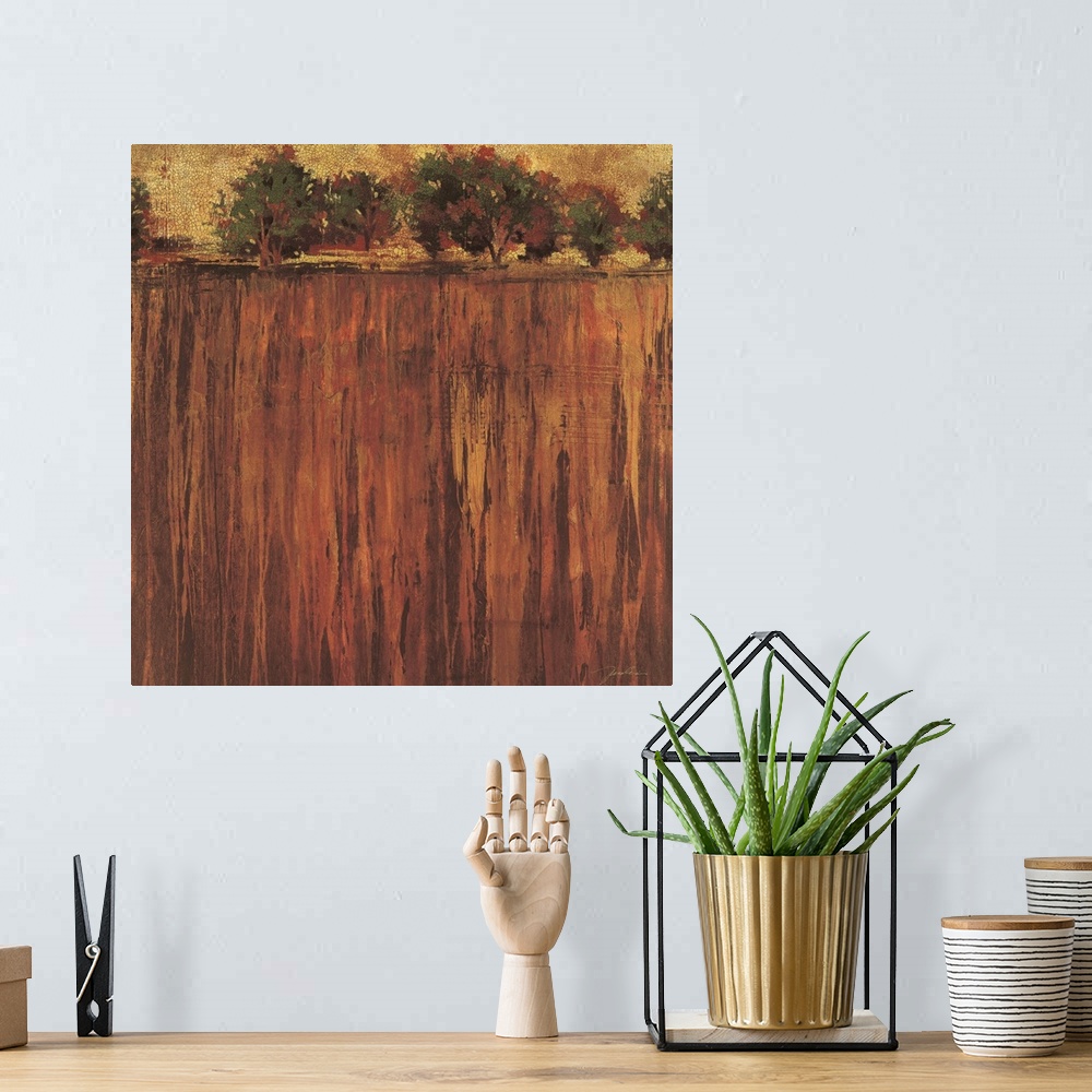 A bohemian room featuring Contemporary painting of a warm toned field leading to trees in the distance.