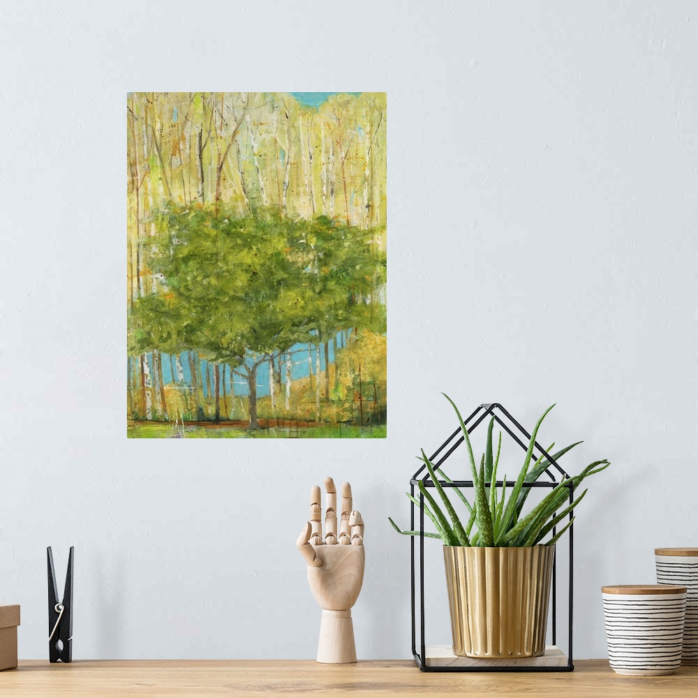 A bohemian room featuring Contemporary painting of a single green tree dwarfed by taller trees with pale foliage.