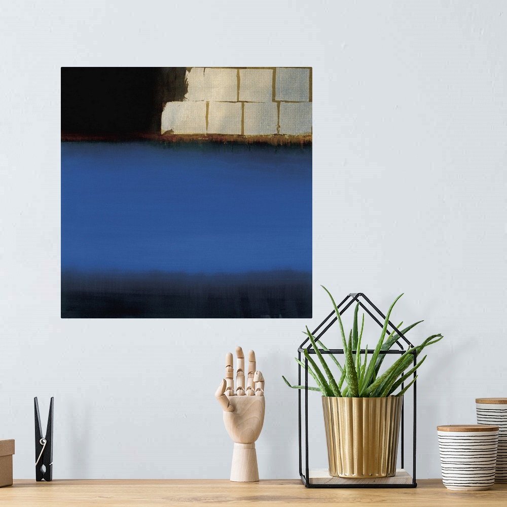 A bohemian room featuring Contemporary abstract painting using deep blue to make what almost looks like an ocean.