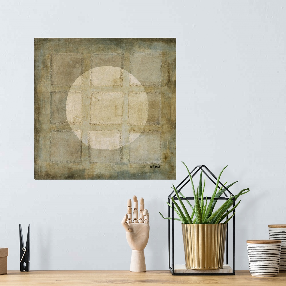 A bohemian room featuring A modern painting of nine squares with a light colored circle overlapping, all in varies shades o...