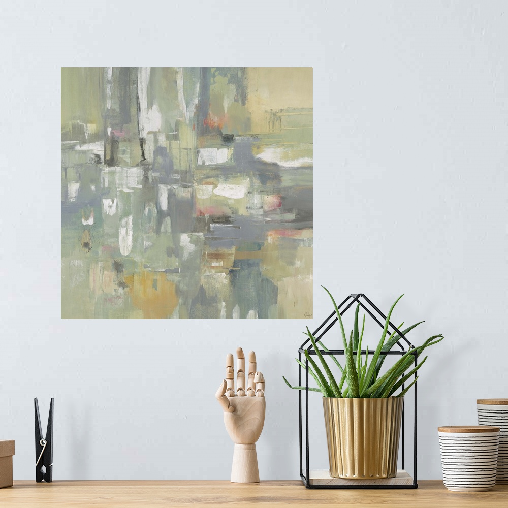 A bohemian room featuring Contemporary abstract painting of pale muted green geometric shapes colliding together.