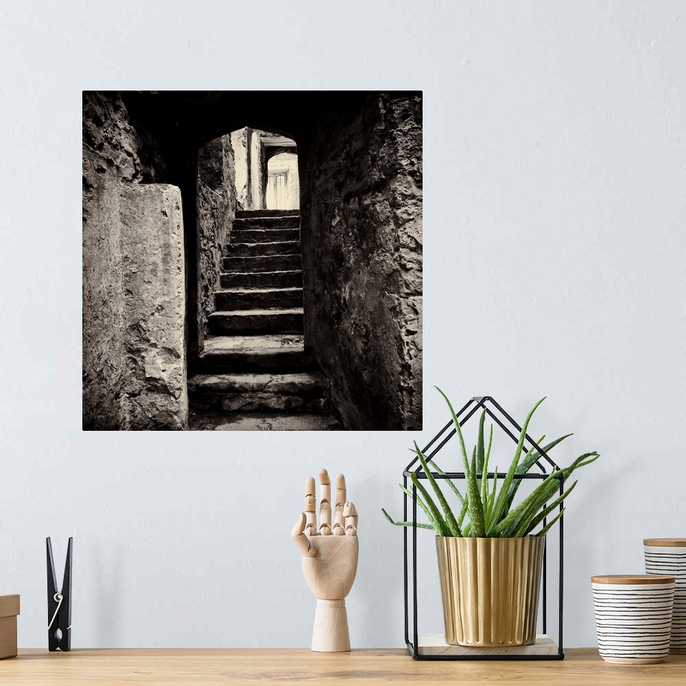 A bohemian room featuring Doorway and steps in medieval castle ruins. Beupre Castle, Wales
