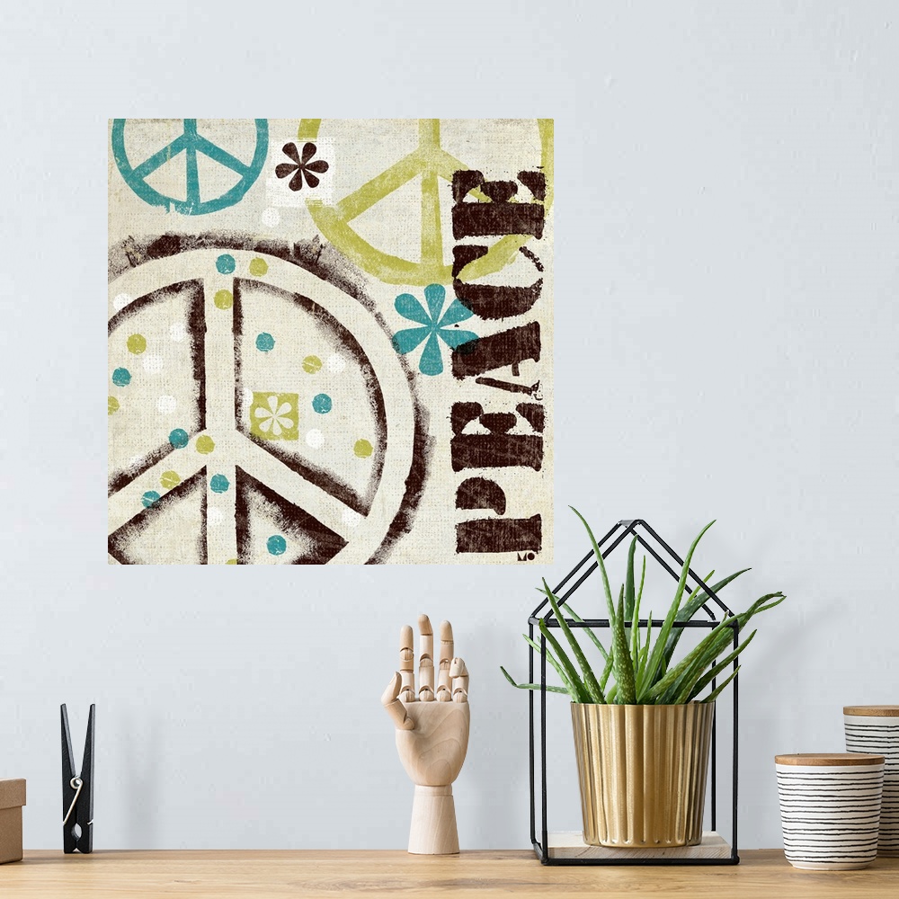 A bohemian room featuring Square retro artwork on a large canvas of several peace symbols surrounded by colorful dots and f...
