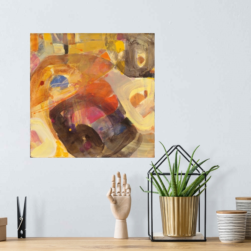 A bohemian room featuring Abstract painting in brown and yellow.