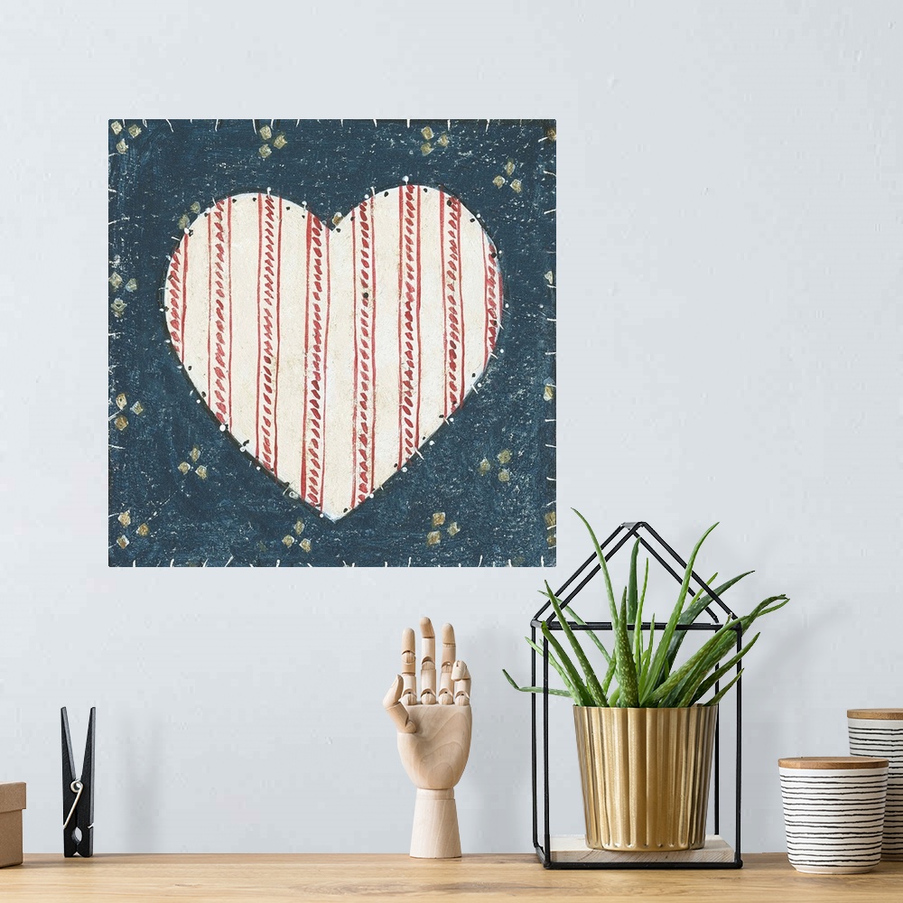 A bohemian room featuring Red, White, and Blue painting of a heart.