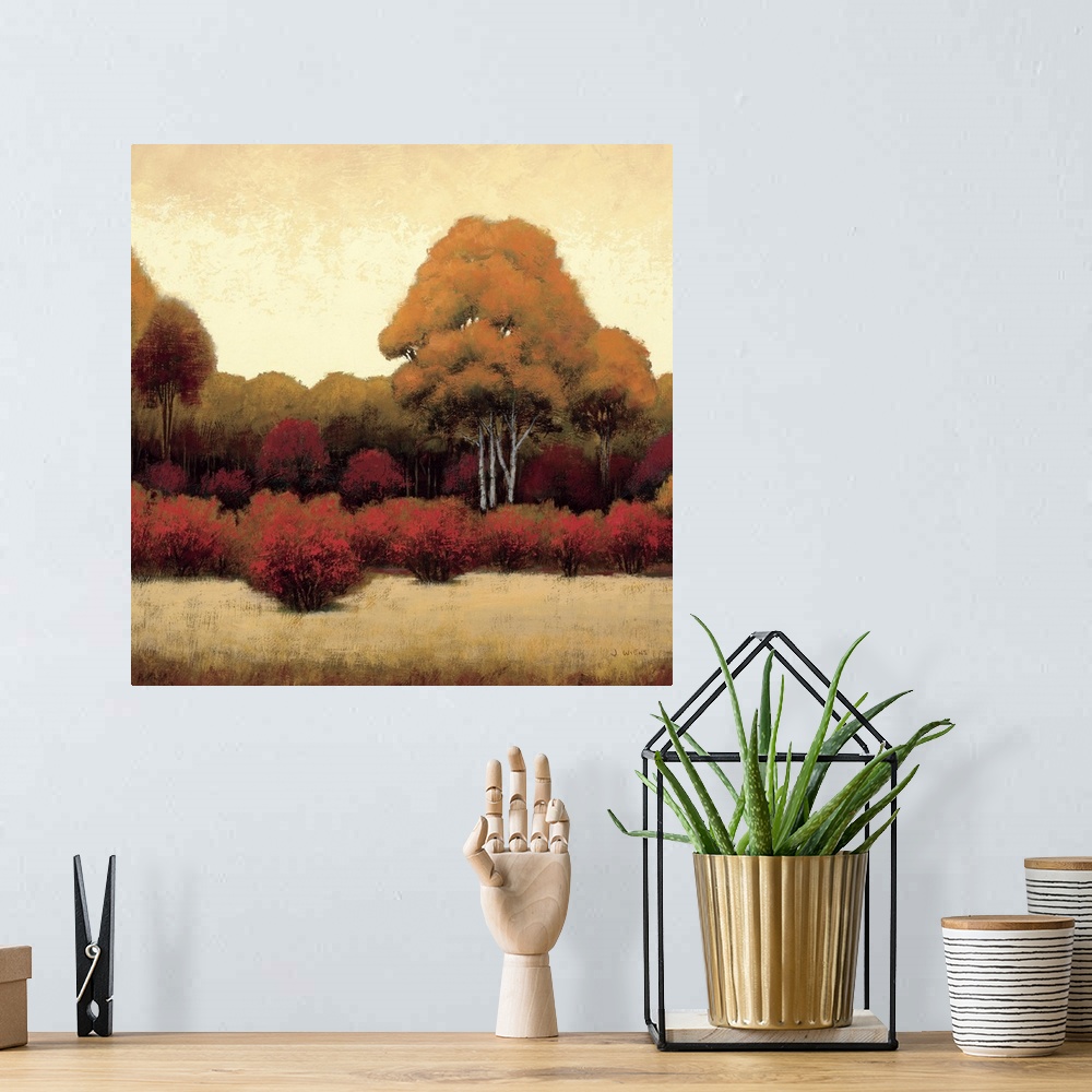 A bohemian room featuring Square home art docor on a large canvas of a warm landscape of trees and bushes on a golden backg...