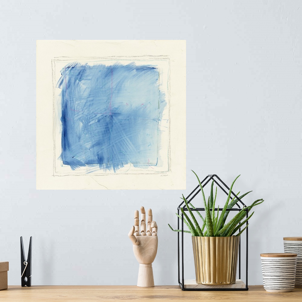 A bohemian room featuring Abstract artwork with a blue square inside of pencil drawn squares on a white square background.