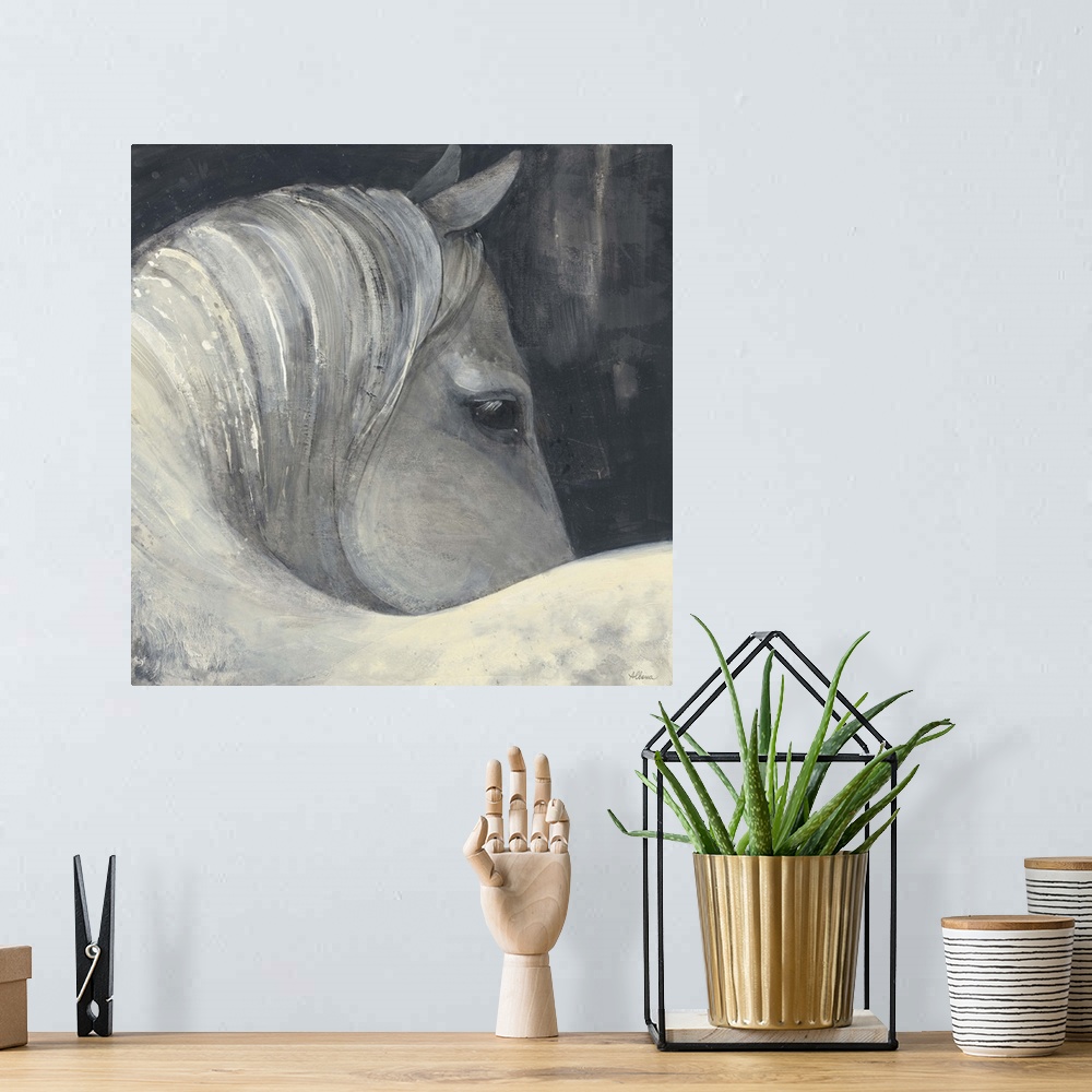 A bohemian room featuring Square grey toned painting of a horse on a dark background.