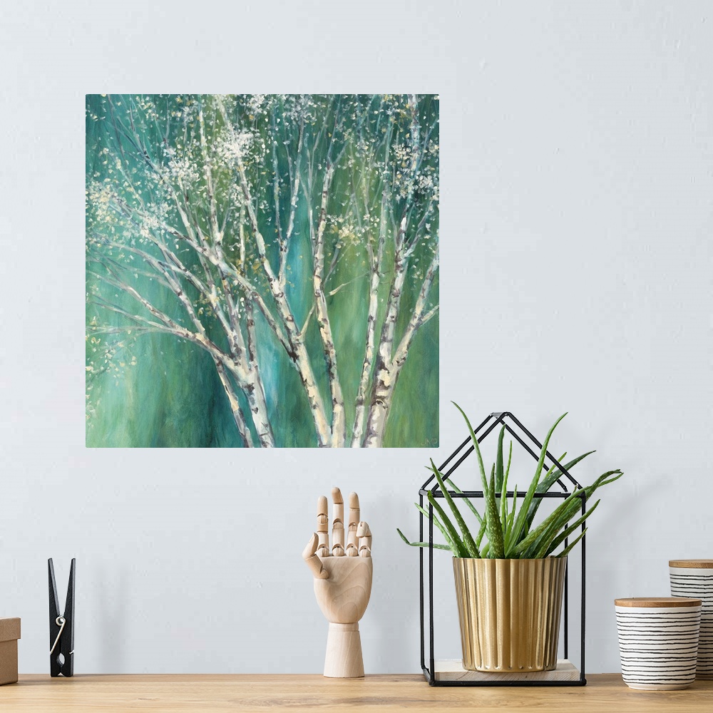 A bohemian room featuring Painting of a white birch tree against a teal background.