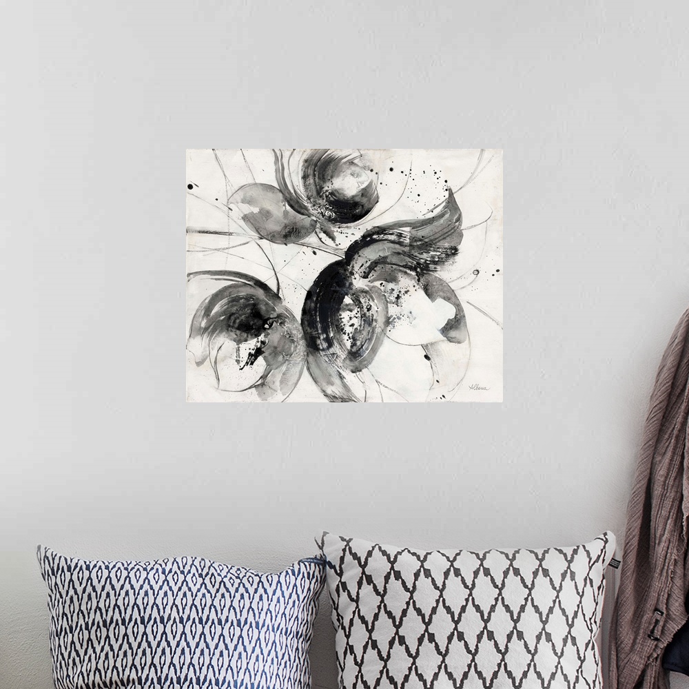 A bohemian room featuring Black and white abstract watercolor painting of flowers.