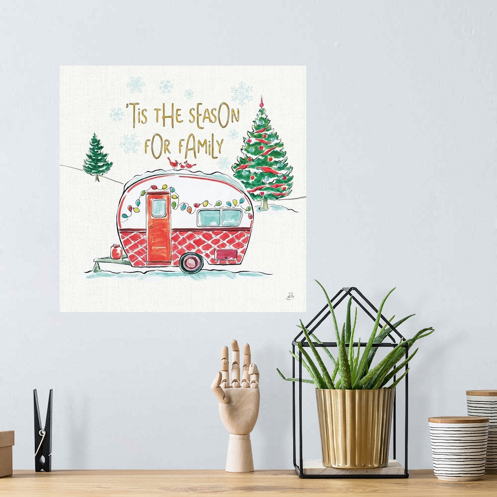 A bohemian room featuring Decorative Christmas themed artwork with the phrase "'Tis the season for family" written above an...