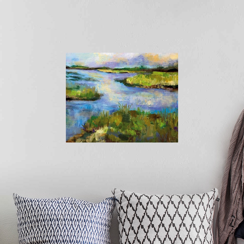A bohemian room featuring Contemporary landscape painting of a stream running through a marsh.