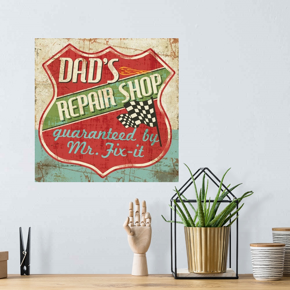 A bohemian room featuring Weathered sign for "Dad's Repair Shop" in a shield shape with a checkered flag.