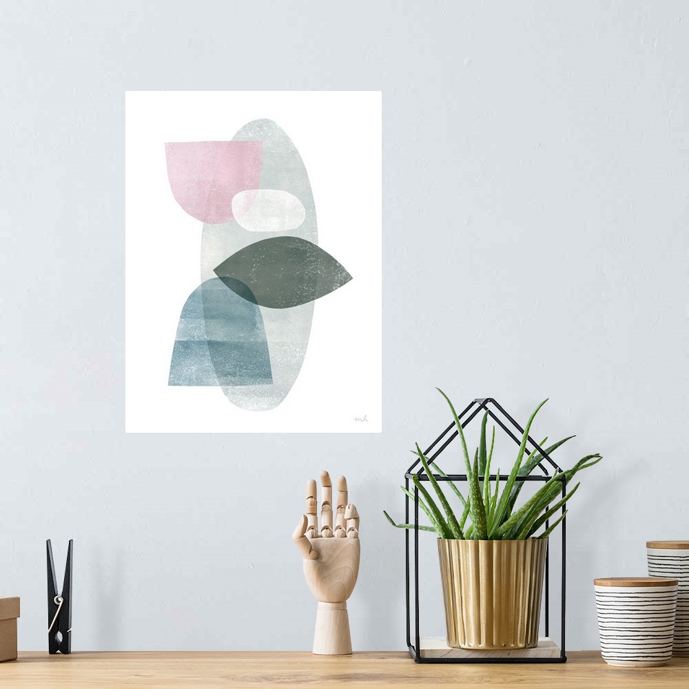 A bohemian room featuring Abstract art with overlapping shapes in blue, pink, white, and grey hues on a white background.