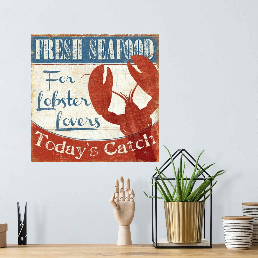 A bohemian room featuring Weathered sign for a fish market, with a large red lobster silhouette.