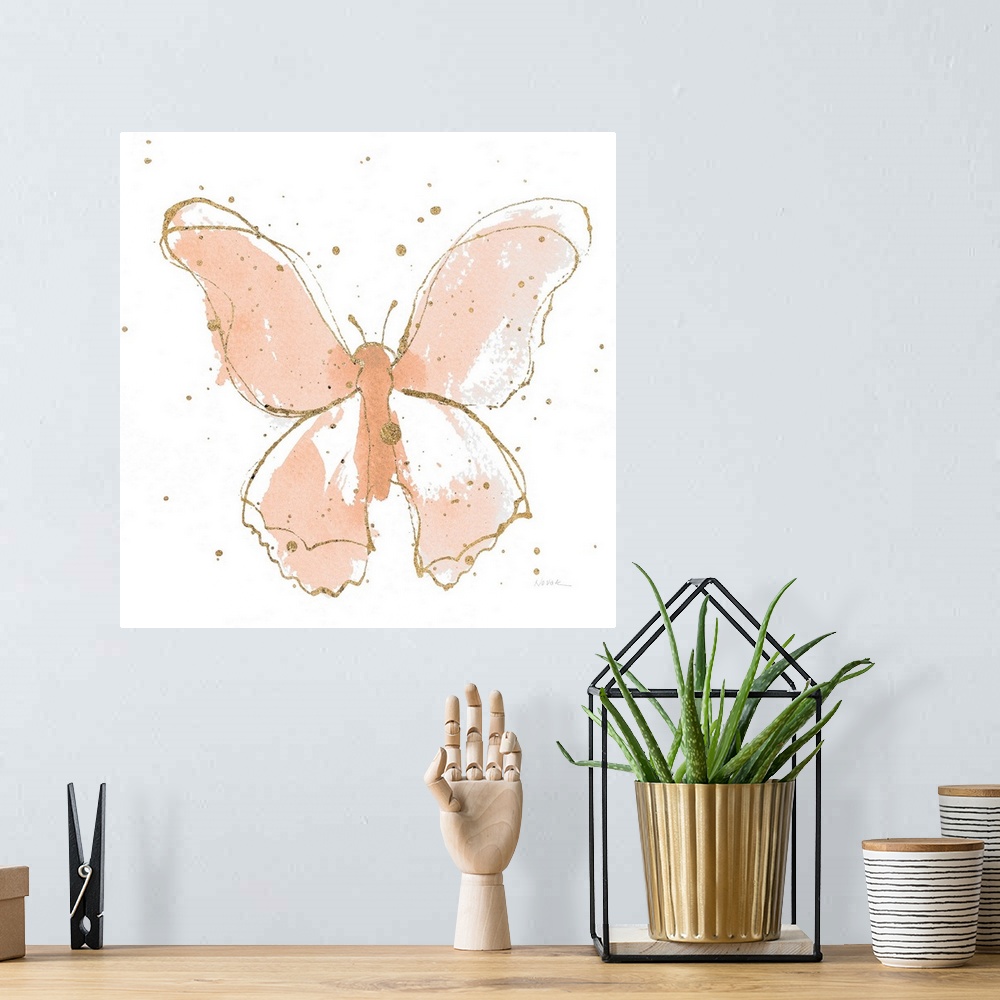 A bohemian room featuring A square watercolor painting of a peach butterfly outlined in gold with gold splatters.