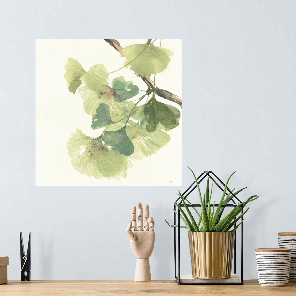A bohemian room featuring Square watercolor painting of a branch with ginkgo leaves in shades of green on a white background.