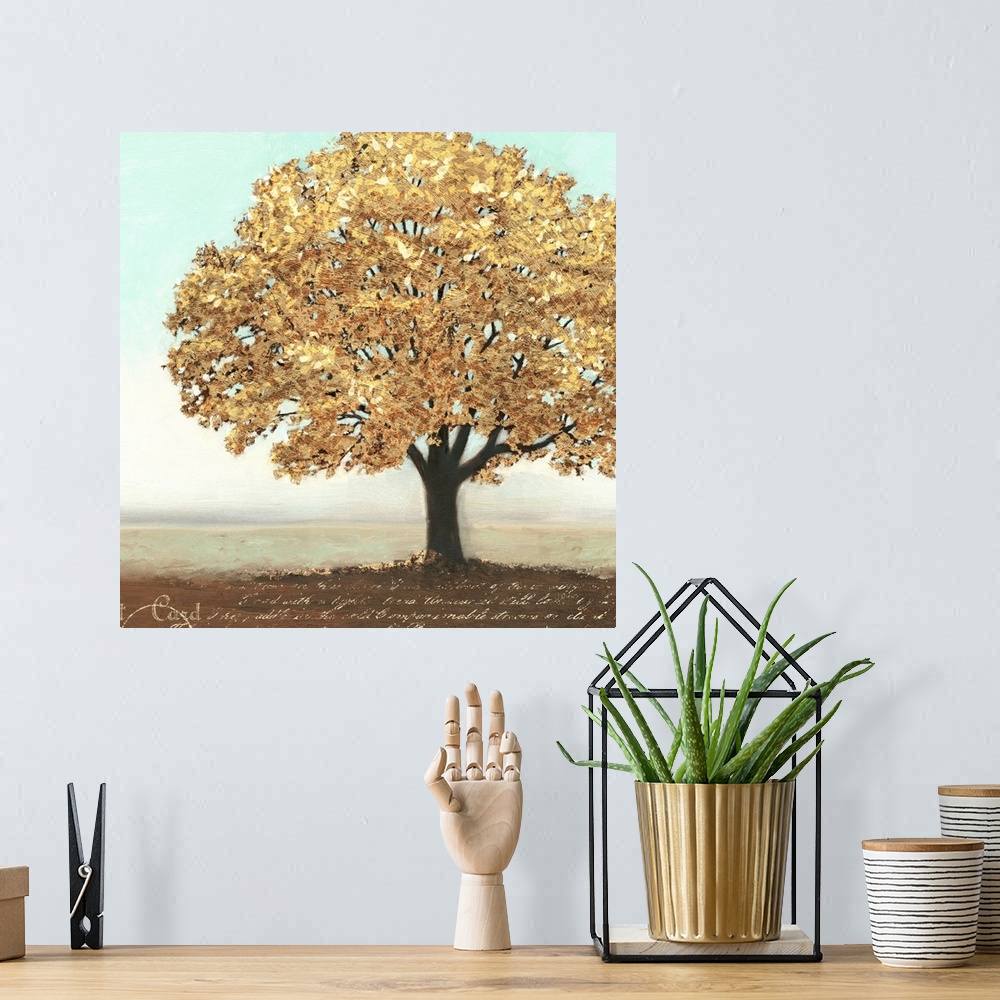 A bohemian room featuring Contemporary artwork of a gold leaved tree with script below it.
