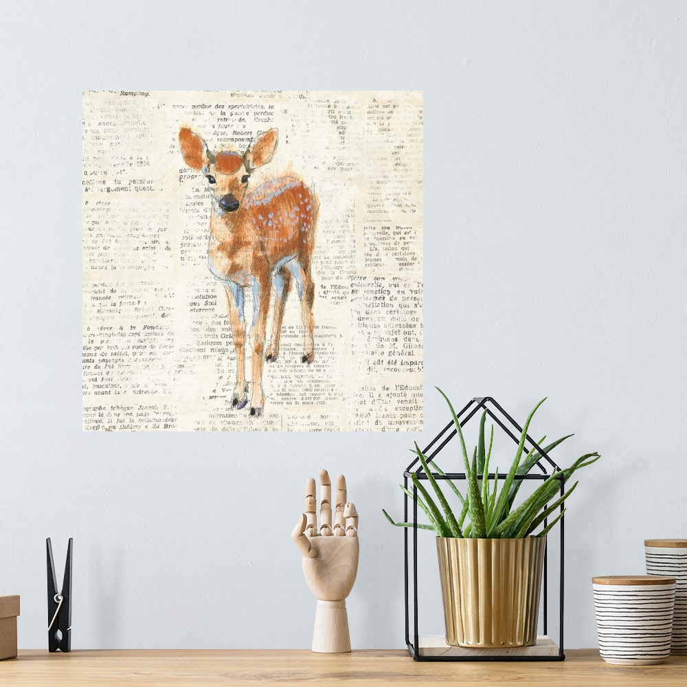 A bohemian room featuring Artwork of a fawn against a distressed newsprint background.