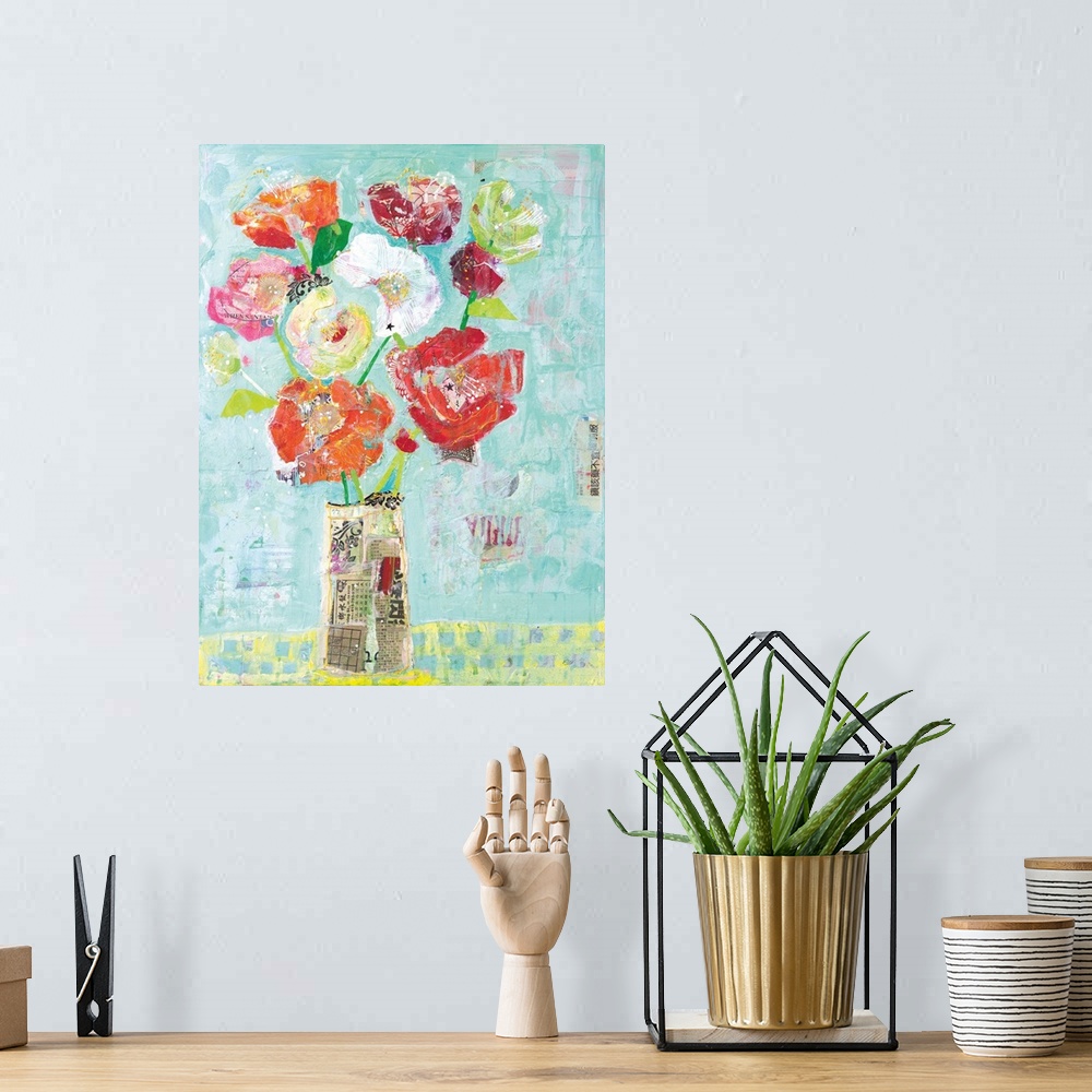 A bohemian room featuring Mixed media artwork creating colorful flowers in a vase made out of newspaper clippings on a ligh...