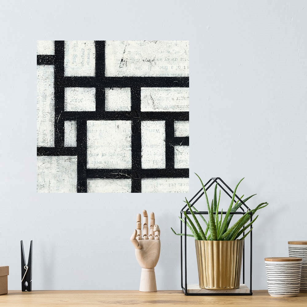 A bohemian room featuring Square contemporary painting of a black and white grid design with faded text peeping through the...