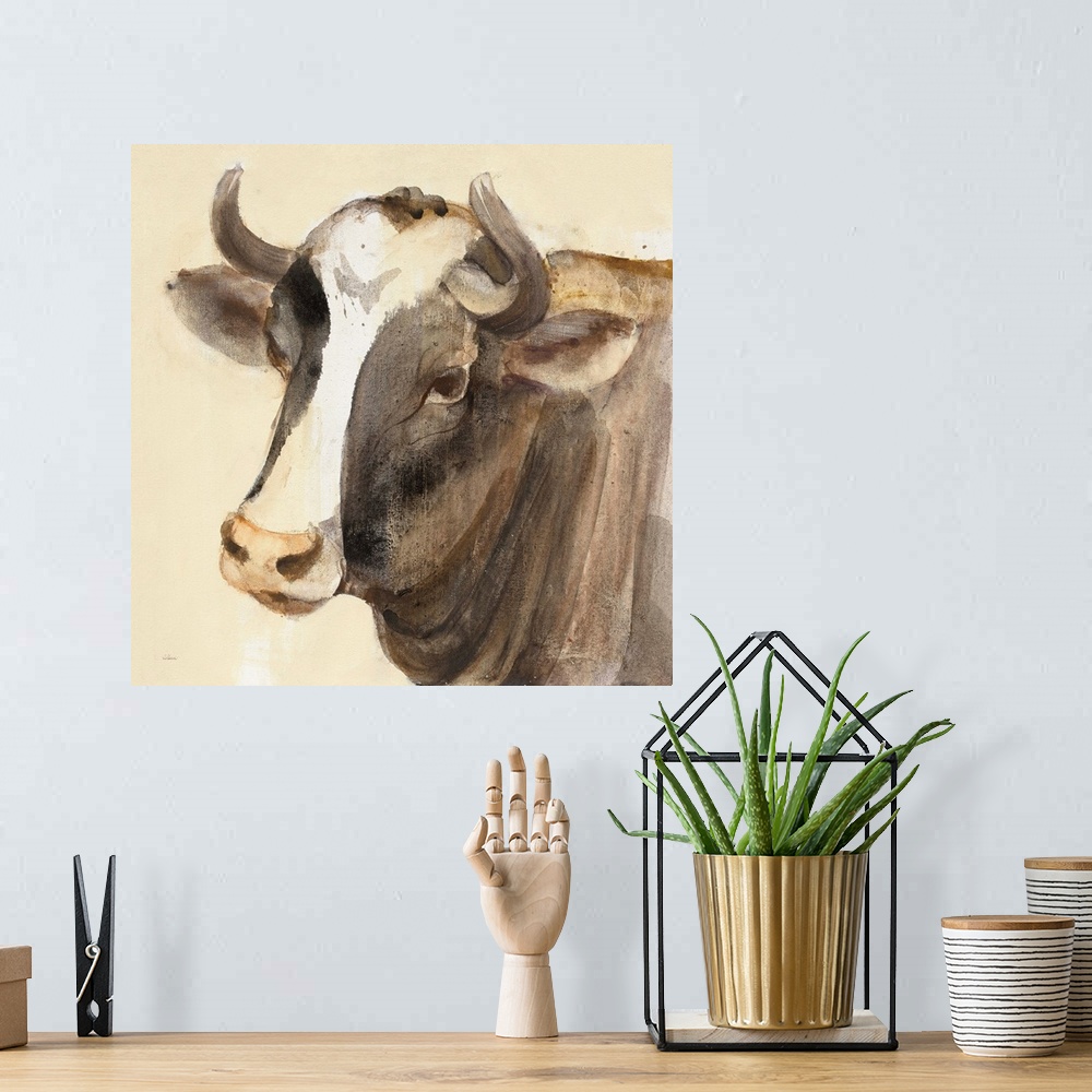 A bohemian room featuring Square contemporary painting of a bull in warm tones of color.